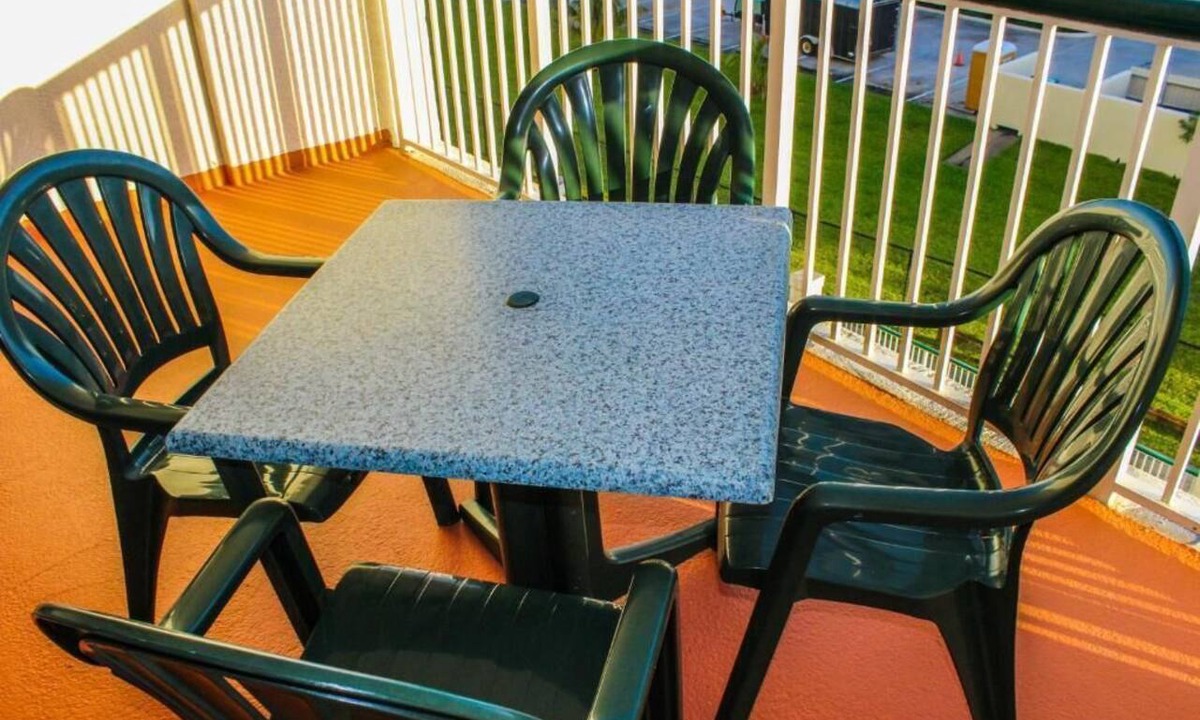 Cocoa Isles Apartment | Beachfront 2BR Retreat | Balcony + Full Kitchen