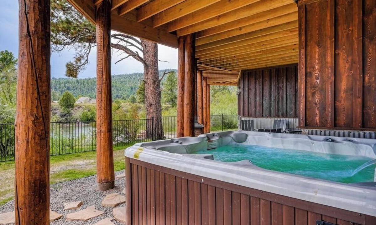 South Fork House | Custom riverfront log home w/hot tub, decks & fireplace