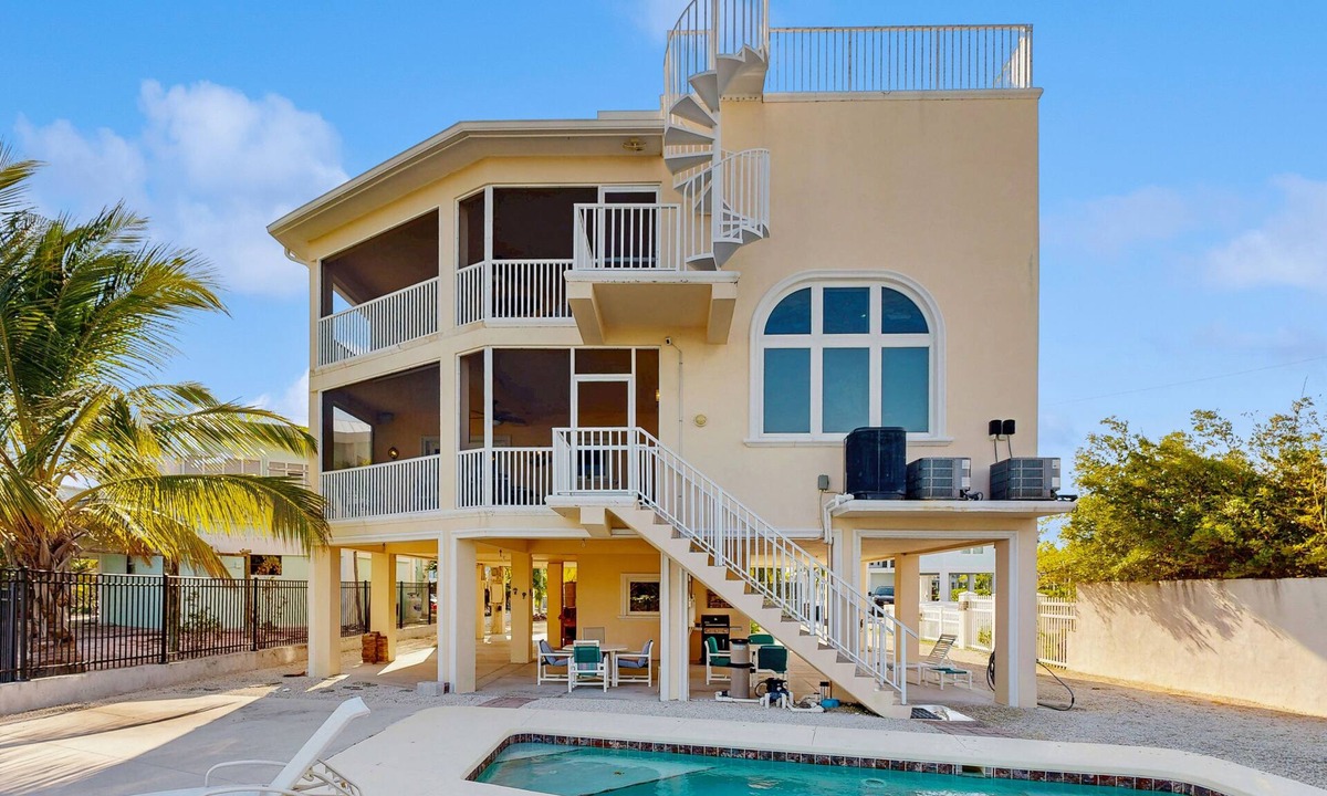 Cutthroat Harbor Estates House | Ocean-view snowbird retreat with private pool, rooftop, lanais, kayak & bikes