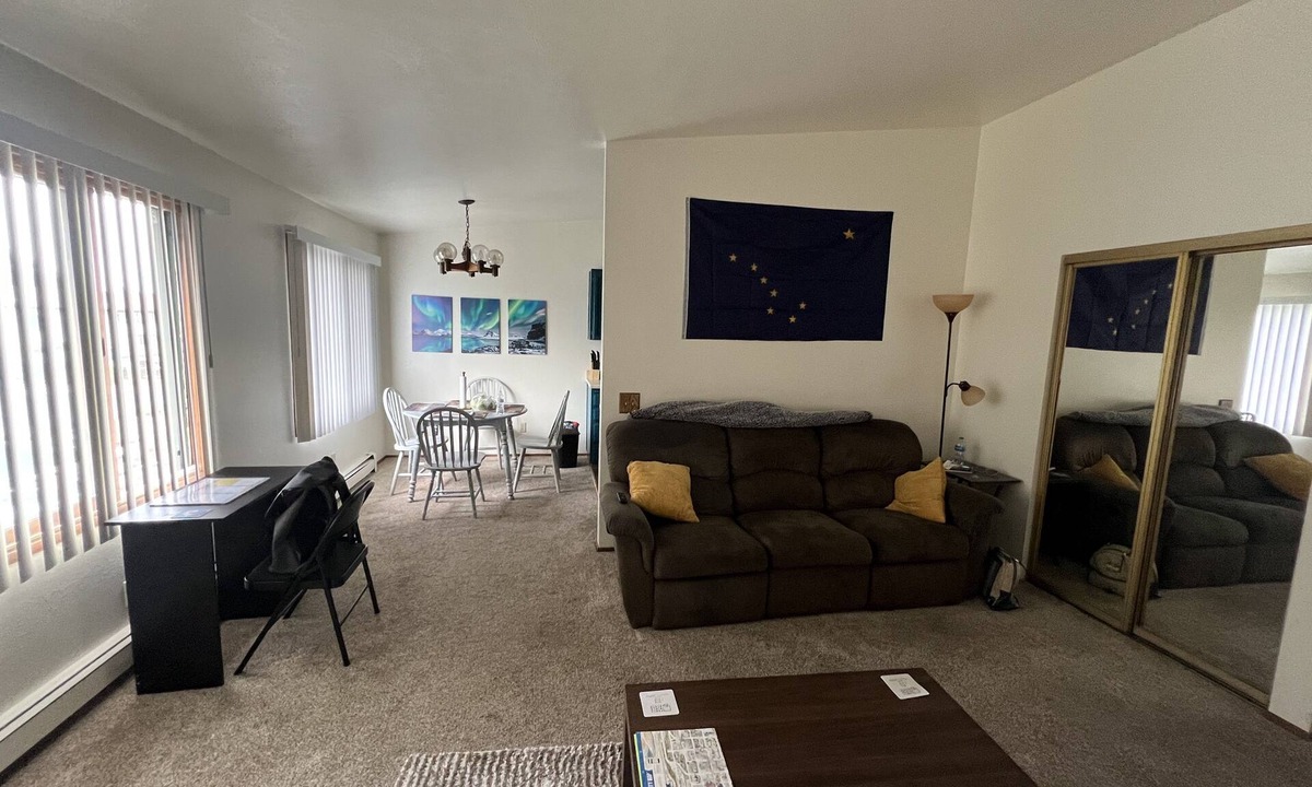 Russian Jack Park Condo | One bedroom top floor condo with Mountain View from bedroom and covered parking