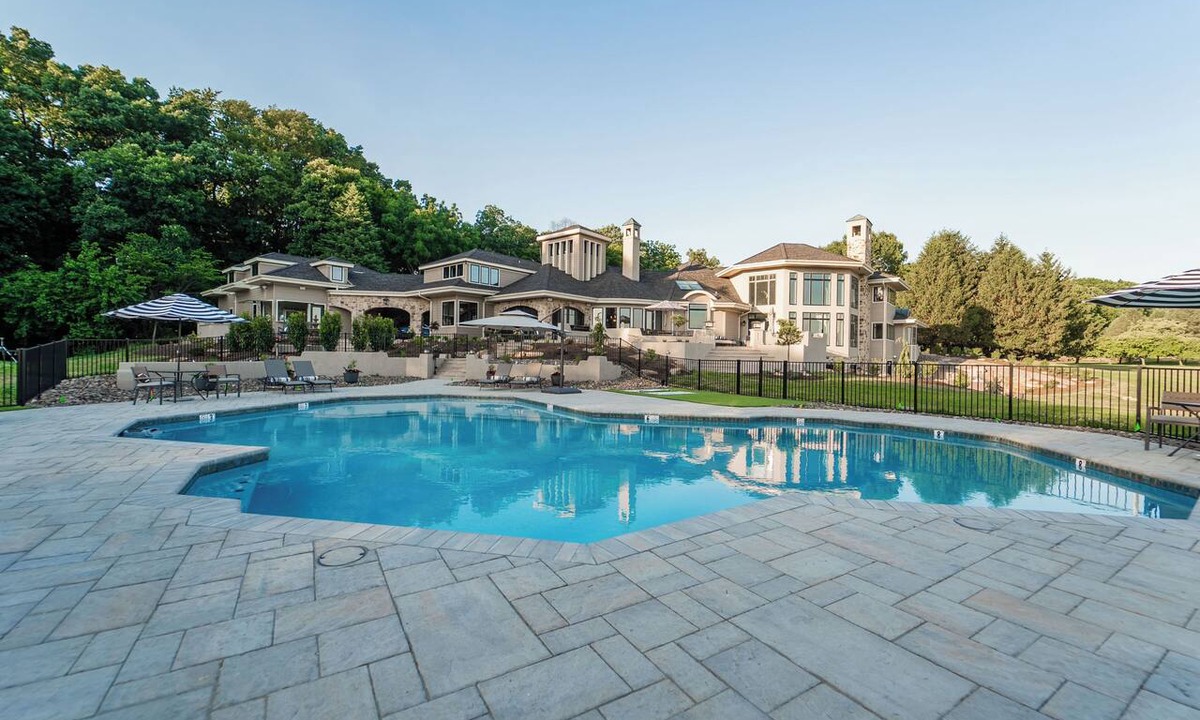 Wernersville House | Private 100-acre luxury estate for up to 30 guests with a resort-style pool, hot tub, game room, sports court, wellness spa, and sweeping sunset views—perfect for reunions, retreats, and unforgettable group stays.