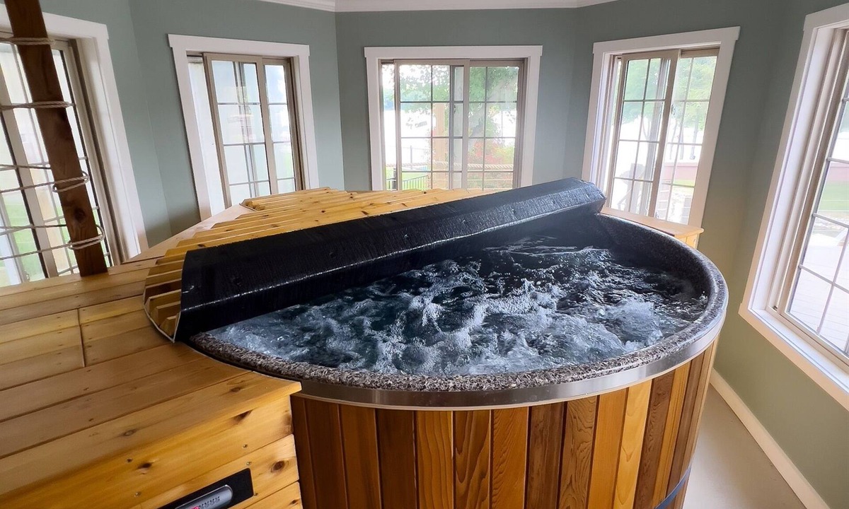 Rome City House | Sylvan Lake escape for 2: private island, indoor hot tub, 84' pier