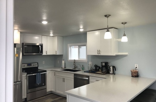 North Douglas House | Beachfront community with city and mountain view.