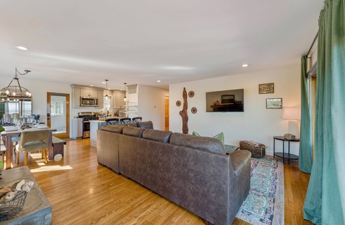 Cambridge House | Bright hilltop retreat with stunning mountain views, wrap-around windows, and cozy seating to take it all in. Nestled on a private, scenic property minutes from charming Cambridge village—perfect for a peaceful getaway year-round.