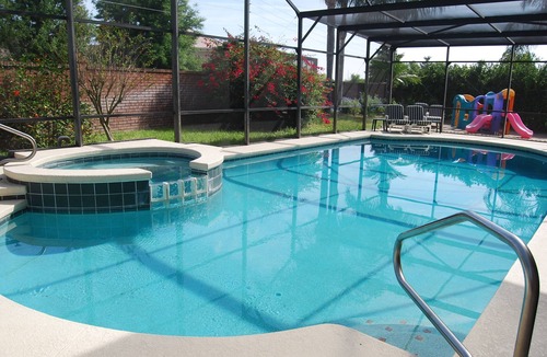 West Kissimmee House | CLEAN! Themed, HUGE salt pool, Private yard, GREAT reviews, Game room, Free BBQ