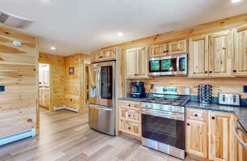 Carrabassett Valley Cabin | Gorgeous dog-friendly cabin with great view, deck, hot tub, & gas fireplace