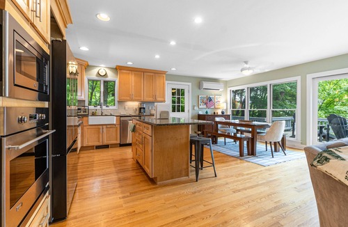 North Lake George House | Gorgeous lakeview retreat with wraparound porch, wood stove, & WiFi - dogs OK