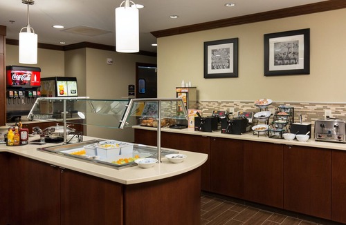 Polaris Apartment | King Suite Near Ohio State University. Free Breakfast Included. Pool Access.