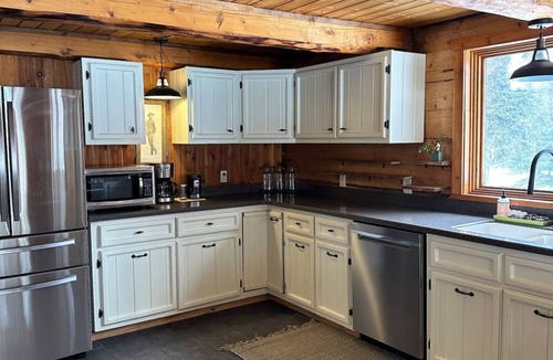 Cohoe Cabin | Log Cabin with Mountains and Lake View, enjoy relaxing in the hot tub