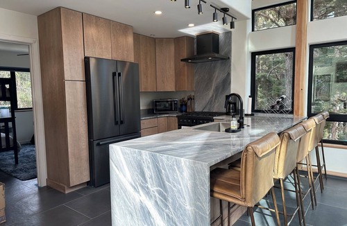 Alyeska House | Luxurious Orca Mountain Chalet - Nestled in Towering Trees with a Private Creek!