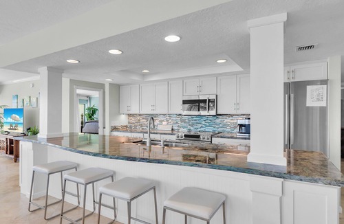 Key Colony Beach Condo | Luxuriously Remodeled & Expansive Wraparound Ocean Views