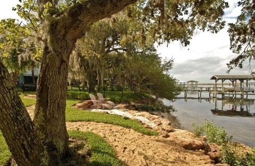 Tropic House | Magical Waterfront Home,Sunsets, Guest House, Beach, Dock, game room, Playground