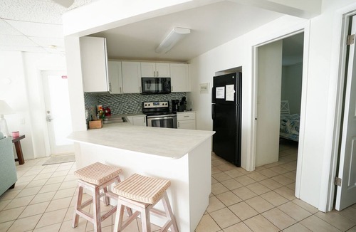 Marathon House | Ocean Side Waterfront Exclusive Affordable Home - Pool , Tennis, Fishing & Golf