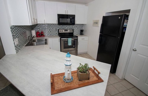 Marathon House | Ocean Side Waterfront Exclusive Affordable Home - Pool , Tennis, Fishing & Golf