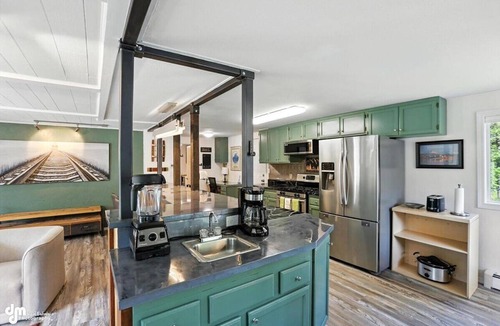Mid-Hillside House | Once a 1950s Alaska Railroad Section House, this unique home blends modern comfort with vintage soul