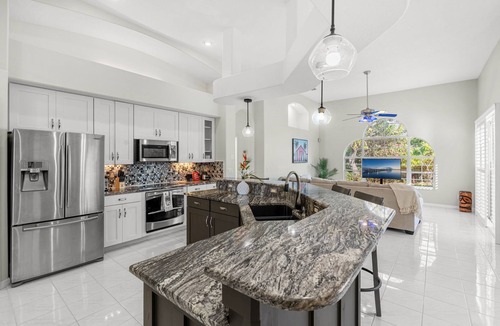 Melbourne Beach House | Paradise Azul Beach Home W/Ground‑Floor Patio, Heated Pool, Lanai & Backyard Retreat 🌴🌊