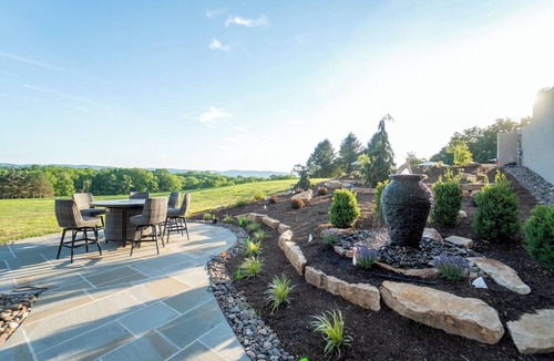 Wernersville House | Private 100-acre luxury estate for up to 30 guests with a resort-style pool, hot tub, game room, sports court, wellness spa, and sweeping sunset views—perfect for reunions, retreats, and unforgettable group stays.