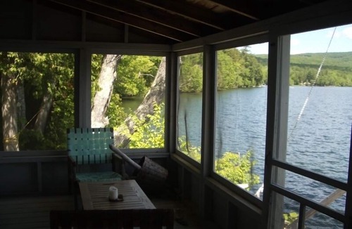 Farmington Cabin | Private three season cabin nestled in woods on shore of pristine Maine lake