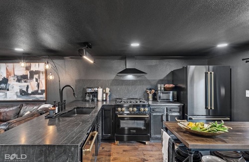 Jefferson Cabin | Relax and unwind at The Whiskey Barrel, a cozy waterfront retreat designed for fun and laid-back lake living. Soak in your private hot tub, paddle out with the kayaks, or spend the afternoon on one of the 4 decks reading a good book