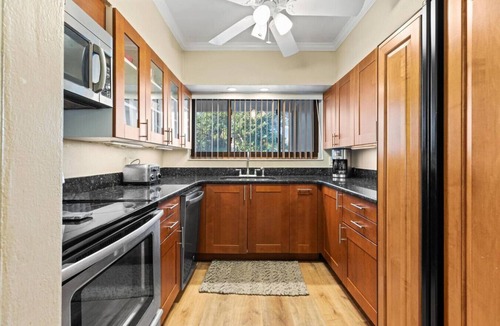 Satellite Beach House | SAND CASTLE: Big beach house. Walk to Beach. Heated Pool in screened pool house.