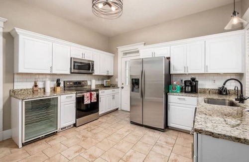 Olde Towne East House | Stately Executive Home with Modern Amenities
