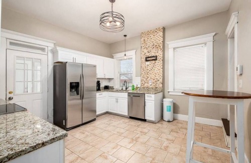 Olde Towne East House | Stately Executive Home with Modern Amenities