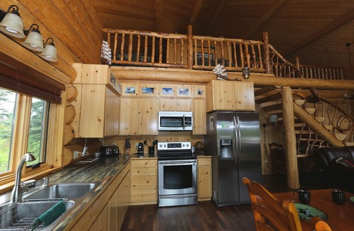 Anchor Point House | Unique Alaskan log home in trees & wild flowers on 14-acre private homestead.