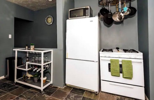 Central City House | Unique Eclectic Tudor - King Bed! Parking! 30 Night Minimum.