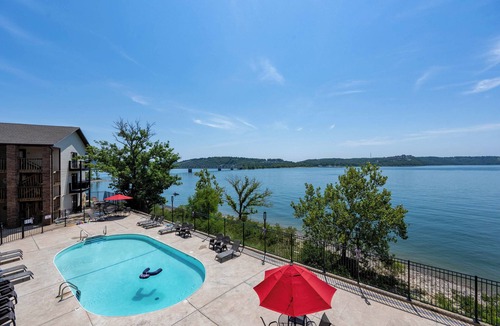 Kimberling City Apartment | Waterfront Pool! Near SDC - Step-free Access!