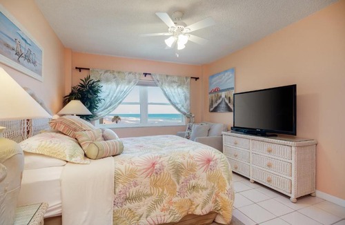 South Patrick Shores Apartment | You cannot get any closer to the beach! 2BR condo