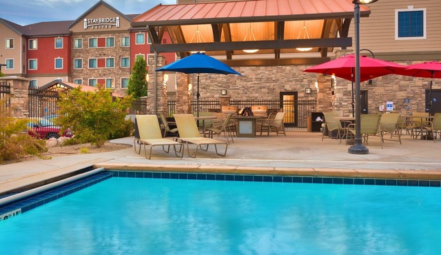 Access to a Heated Pool & Hot Tub! Free Breakfast Buffet. 1 Bedroom Suite.