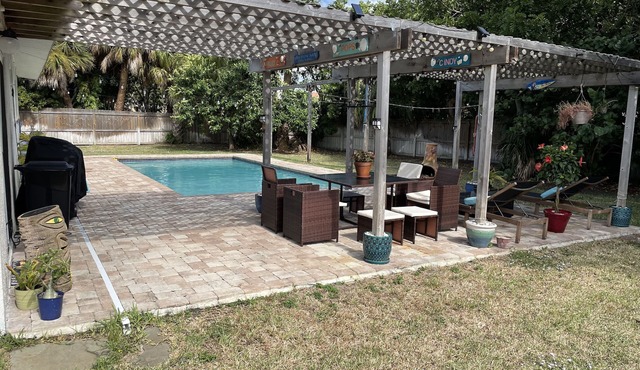 Beach house with HEATED pool one block from the beach!