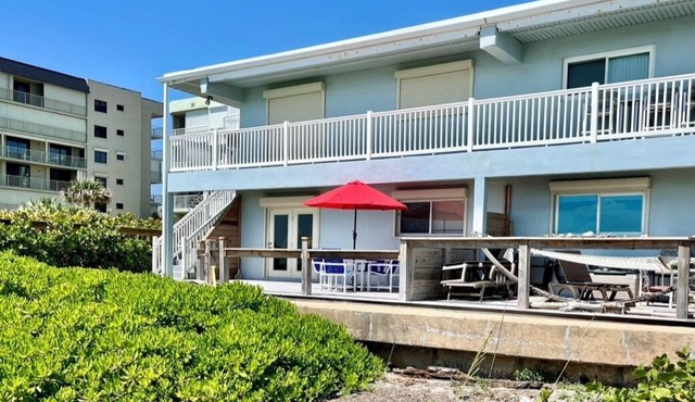 Beachfront ground floor condo with deck and heated pool