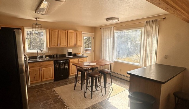 Cozy Cottage Tucked back with an Amazing View of Pioneer Peak!