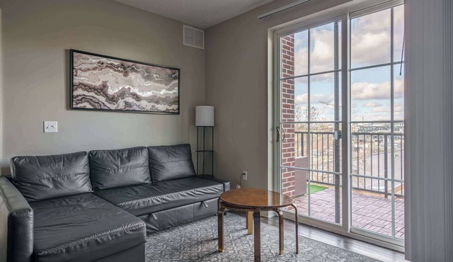 Downtown Views from a Stylish 2BR with Balcony