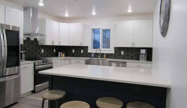 Exceptional Home with Htd Garage in Town