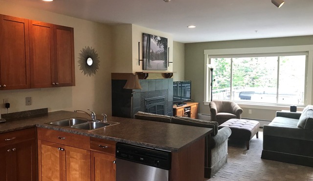 High End 3 bed 3 bath ski in/out condo with private hot tub on the back deck!