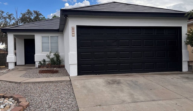 Modern Tesla Smart Home in Albuquerque – Solar Roof & EV Charging