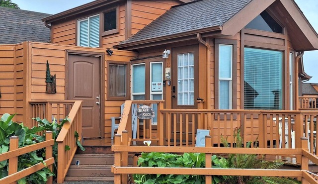 Ocean Cabin 23 is a cozy seaside bungalow with loft, limited ocean views, and private beach.