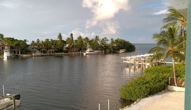 Ocean View with protected dock on lagoon with private boat ramp