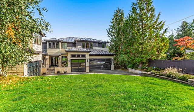 Upscale waterfront estate with private dock, fireplace, & gourmet kitchen in Fox Island