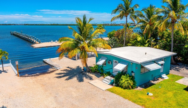 Waterfront Cozy Cottage with Boat Ramp & Dock!